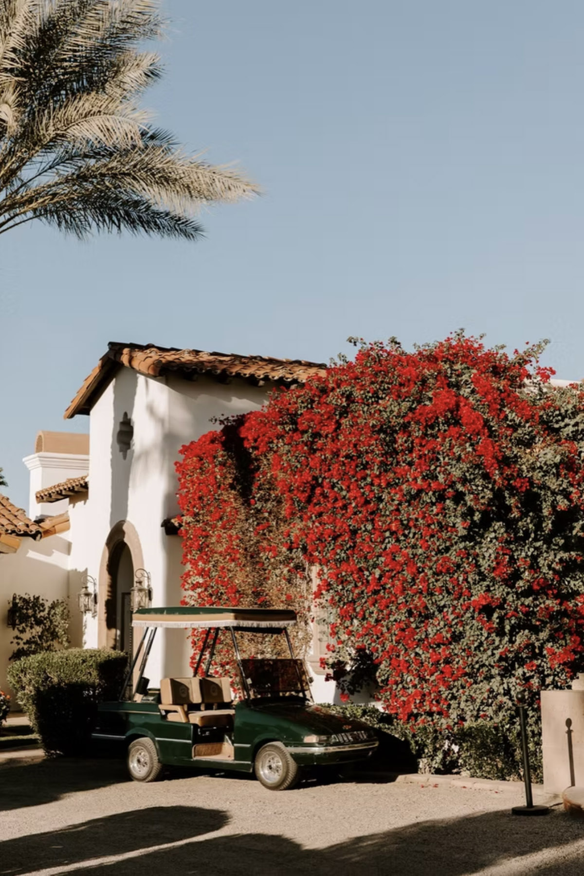 Estate archway covered in bougainvillea